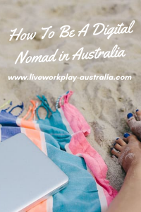 Feet On The Sand With A Striped Towel And A Laptop