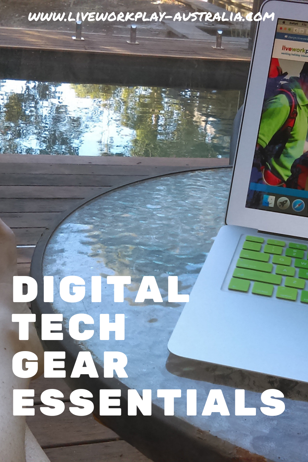 Tech Gear To Take Travelling. A Laptop On A Table By A Pool.