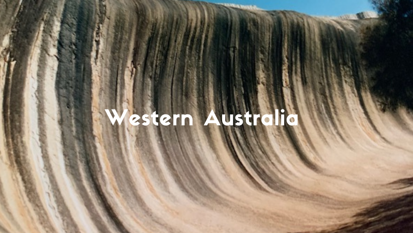 Wave Rock Is A Natural Wonder In Western Australia. A Stone Carved Out By Wind And Rain To Look Like A Wave.