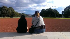 Sitting On Steps Of National War Memorial Canberra Looking Down To Parliament House.