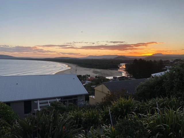 View over Gerroa with 7 Mile Beach and the mountains.