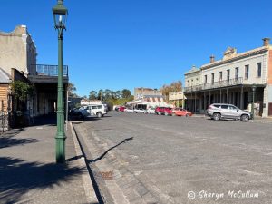 old buildings along wide main street of Clunes.