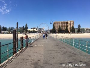 looking back at buildings on the beach of Glenelg from end of Glenelg pier.