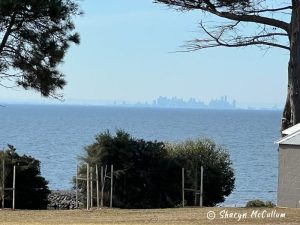 View from Portarlington over Port Phillip Bay to the skyline of the city of Melbourne.