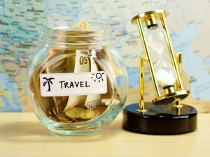 Save money by putting cash in a jar to fund full-time travel around Australia.