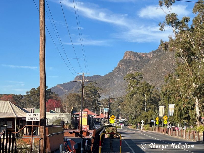 Main street of Halls Gap overlooked by Grampians.