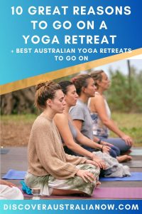 4 people sitting cross legged on yoga mats practicing yoga PIN