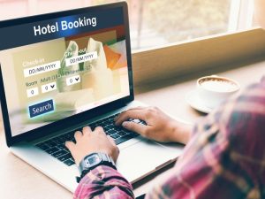 hotel booking site on a laptop booking accommodation
