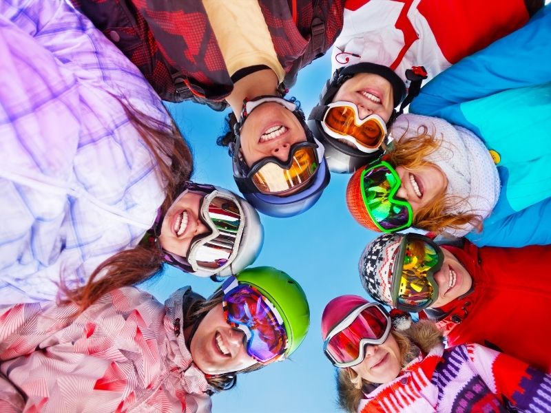 Ski friends wearing the right ski gear in the snow