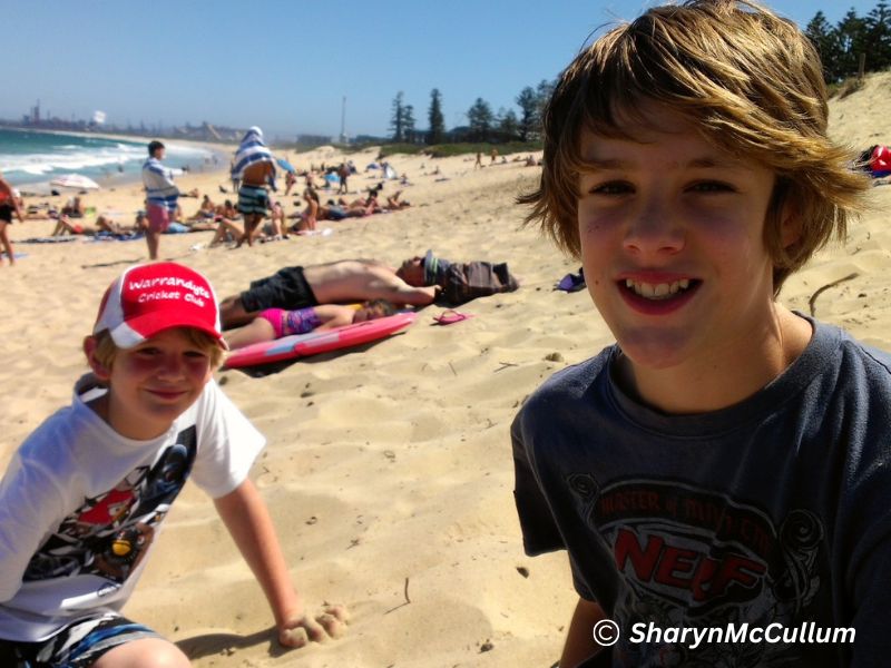 L&CWollongongC Travelling Australia with kids. My kids on Wollongong City Beach.